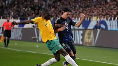 Socceroos hold on to draw with Japan