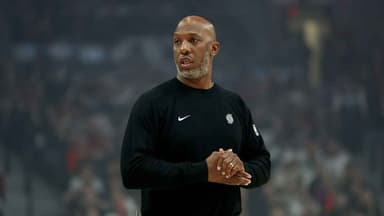 NBA coach and player arrested in federal investigation