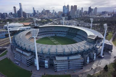 Two men charged after being caught with firearms at the MCG